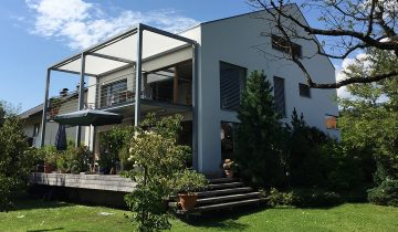 Balkon-Sonnensegel Shadesign creme / natur modernes Haus